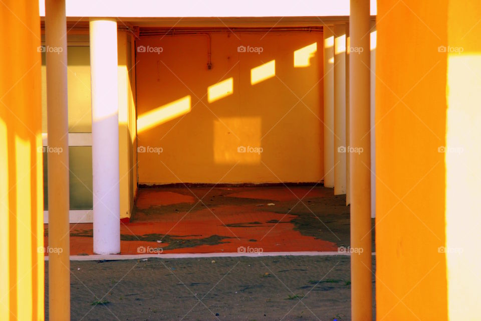 sun rays design on yellow walls