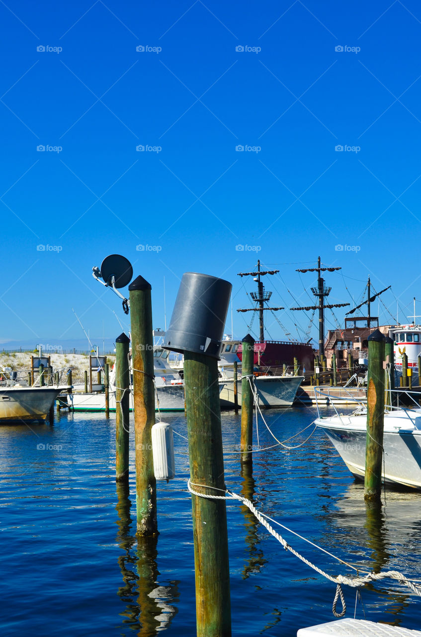 bucket on a pier in the Gulf of Mexico