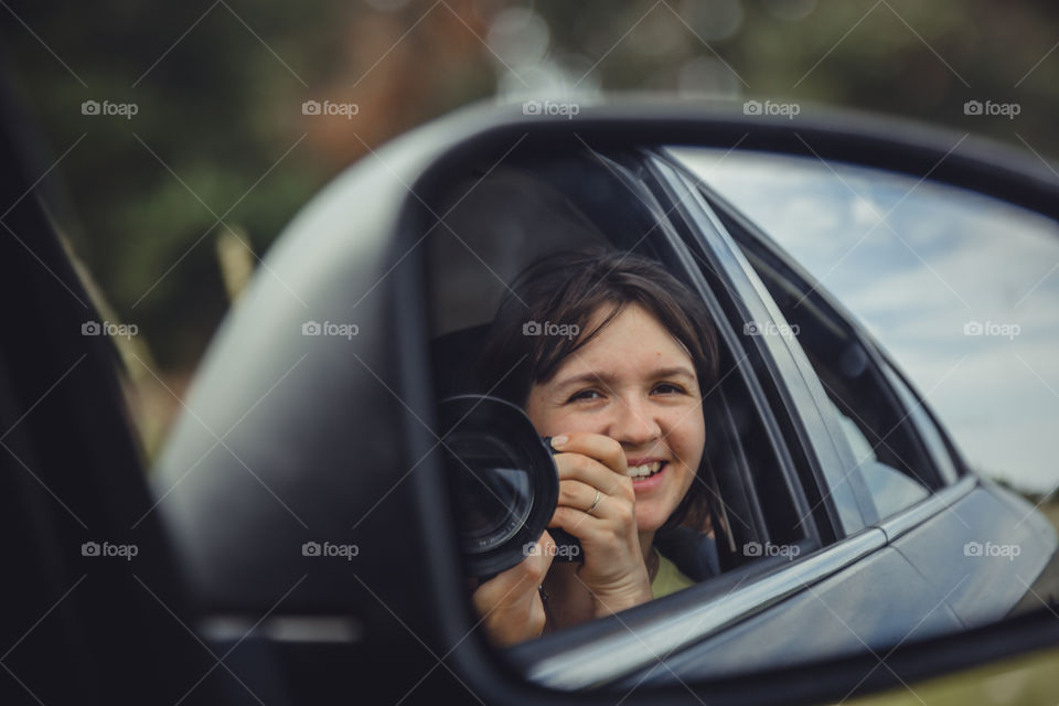 Self portrait in car mirror 