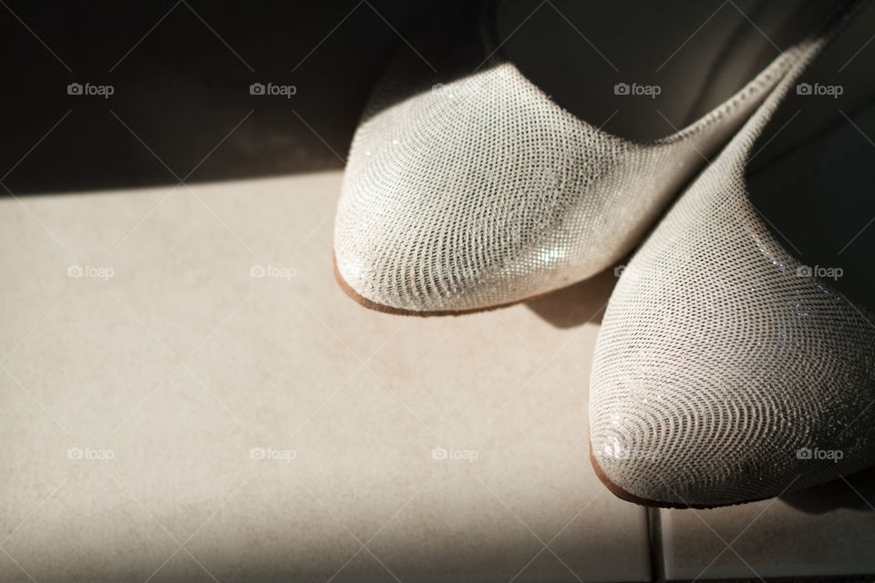 Close-up of bride shoes