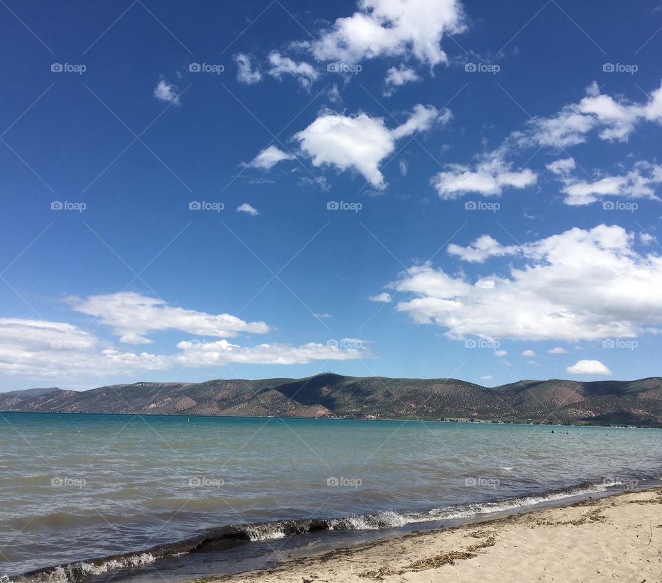 Bear Lake, Utah. Because sky and mountains! I love being in water! 