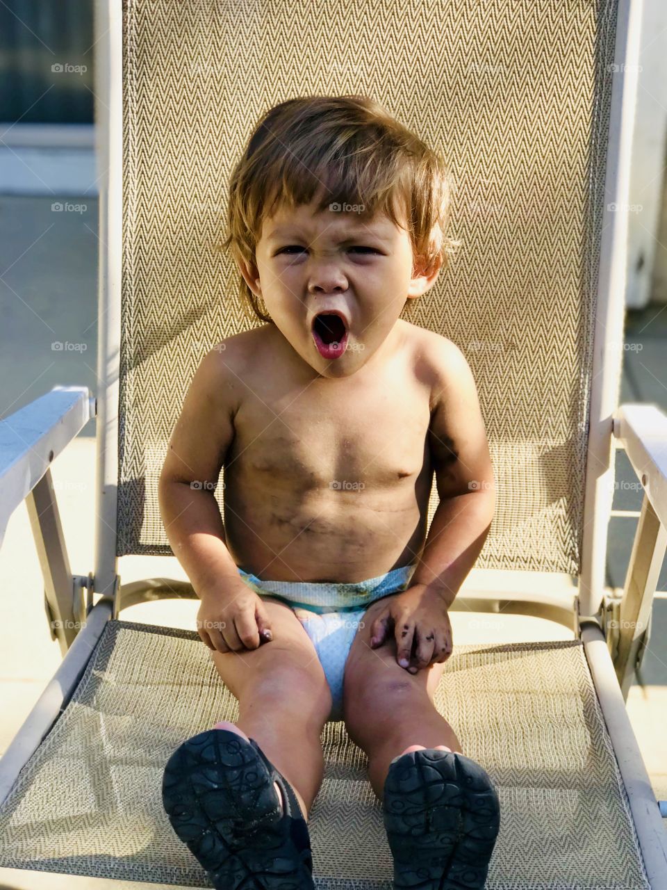 Andrew was playing in the backyard 