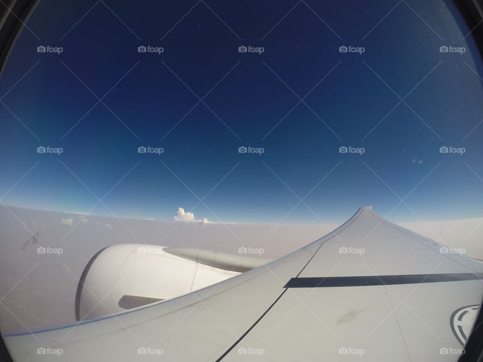 Above the sky. Please keep your seatbelt fasten all the time 