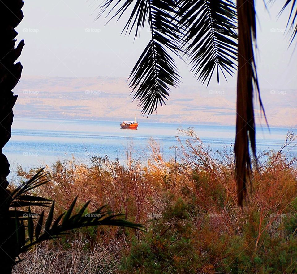 Fishing boat on the sea of Galilee in Israel. View from Gerasene