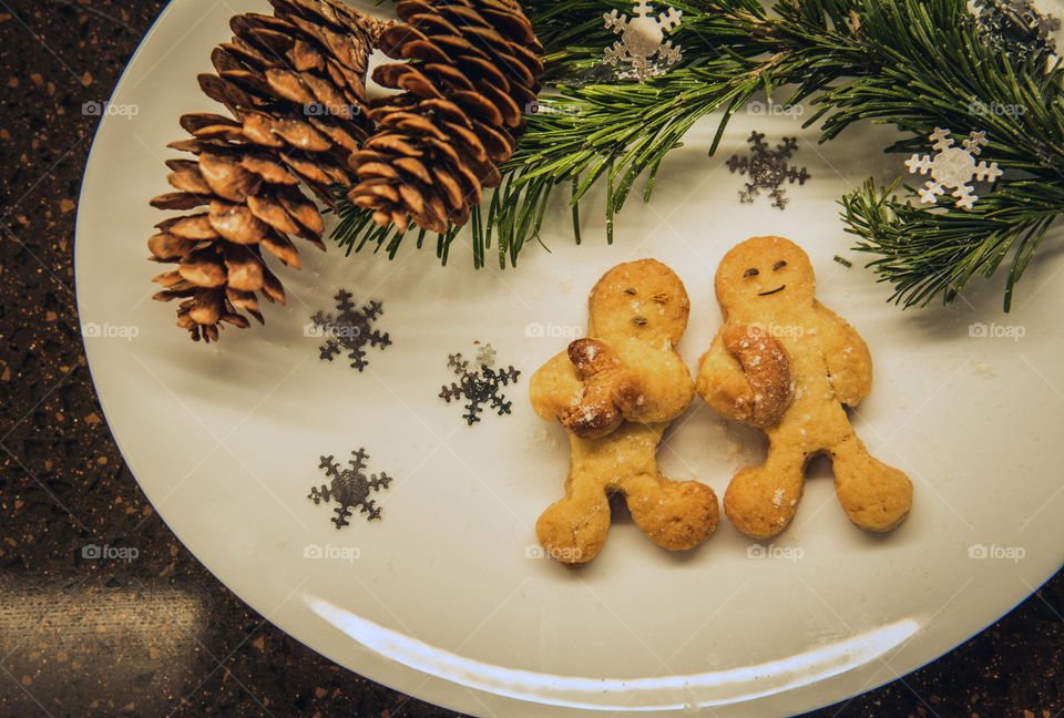 Cookies with Spruce branch on a plate