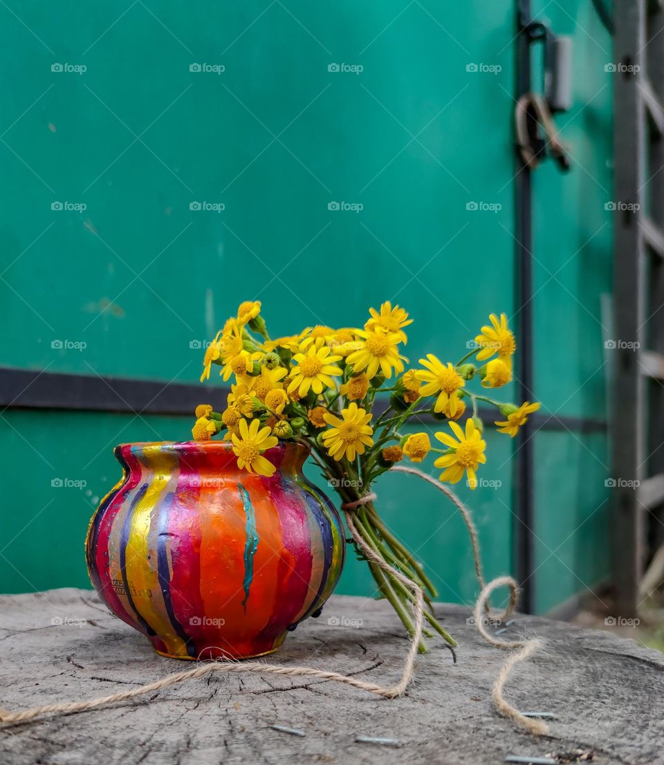 Handmade vase with spring flowers