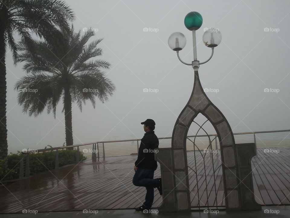 Winter in Abu Dhabi. Chilling in a foggy morning