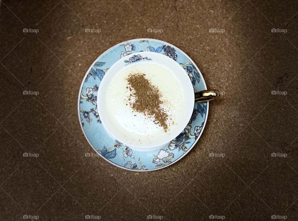 on the plate, sahlab with cinnamon 