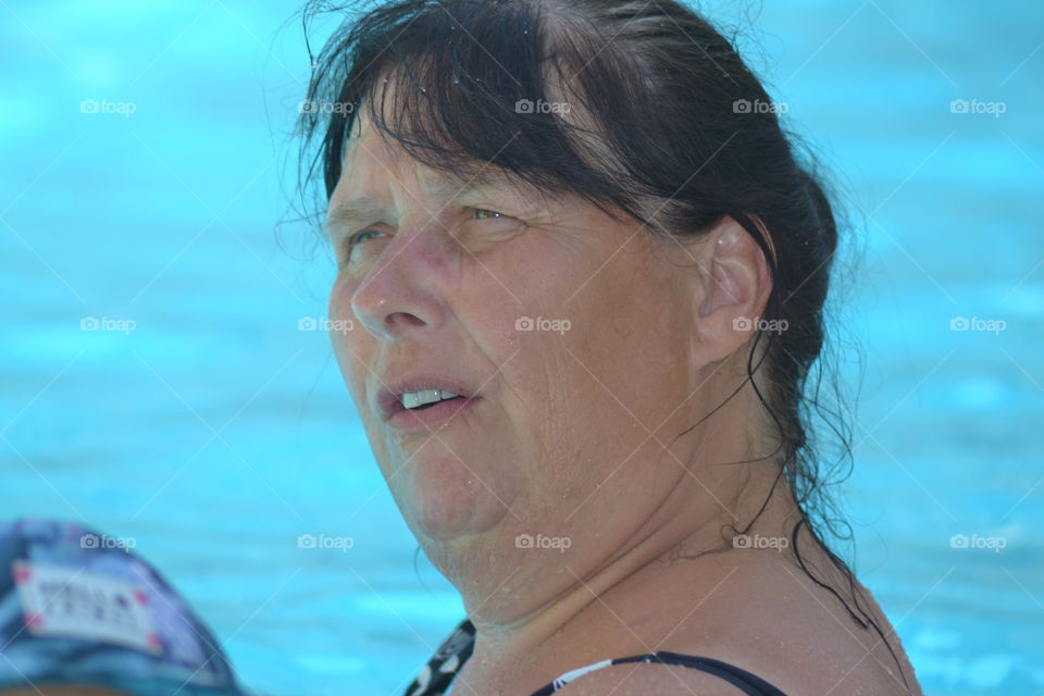 female in pool