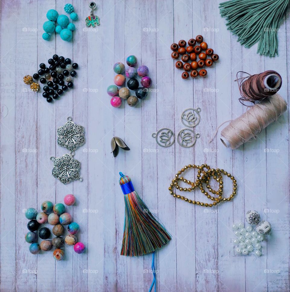 Close-up of beads and multi colored broom
