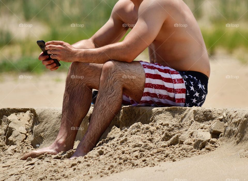 Texting on the beach