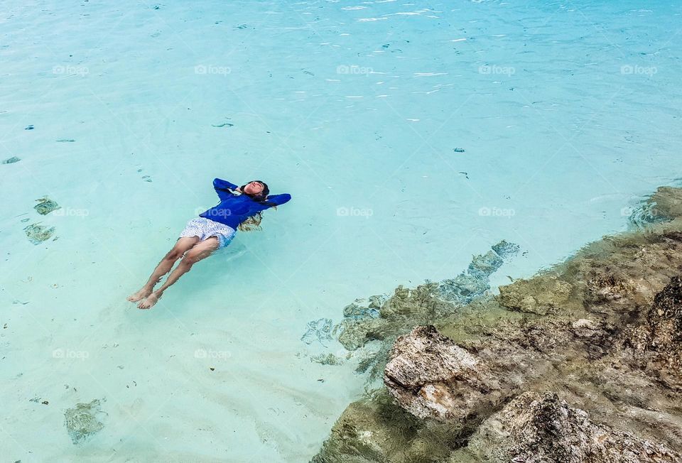 In my most favorite place in the world. The beach with crystal clear water. Summer time!!!!