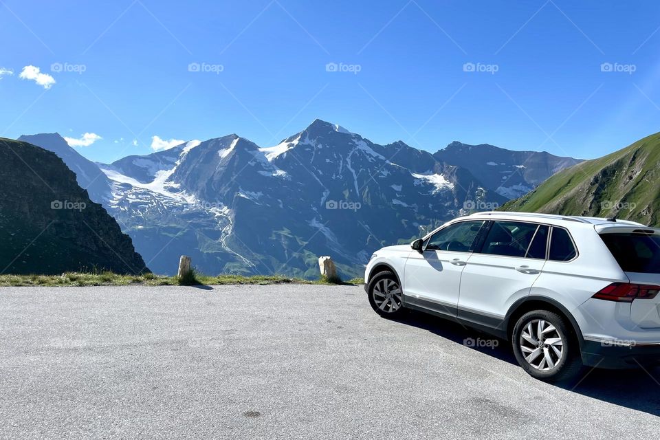 Road trip on Großglockner high alpine road  in the alps of Austria on a sunny summer day, view of mountains and road