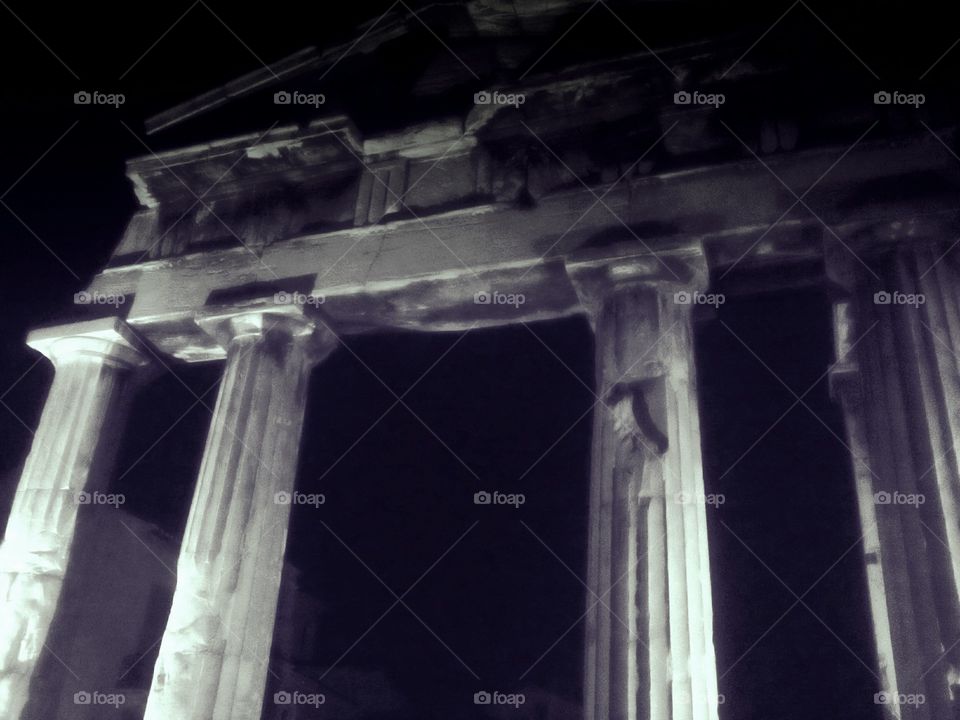 ancient Greek ruin at night