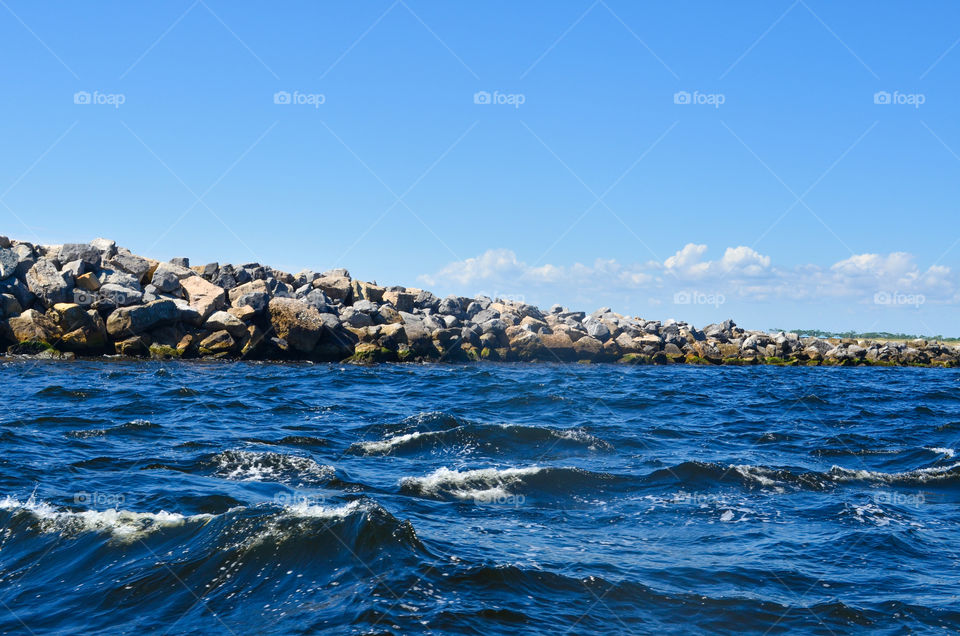 Waves near a rock break in Destin Florida