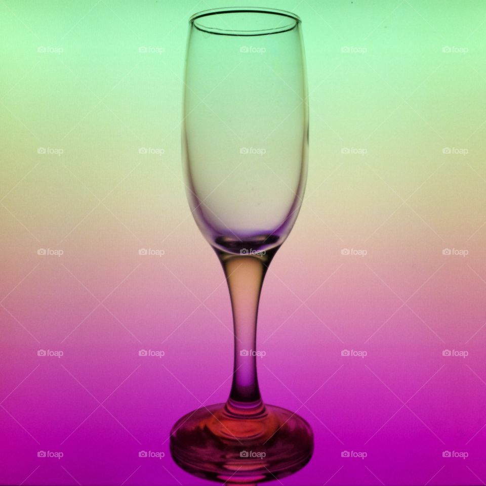 Wineglass on a pink background 