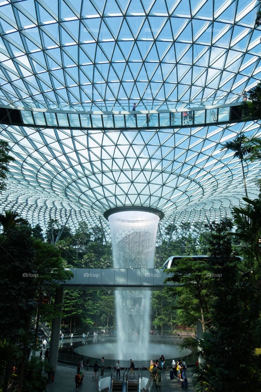 glass roof with water flowing through