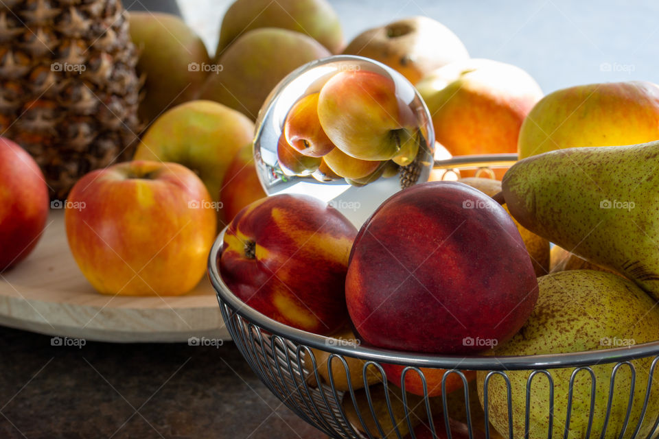 fruit basket and glass ball