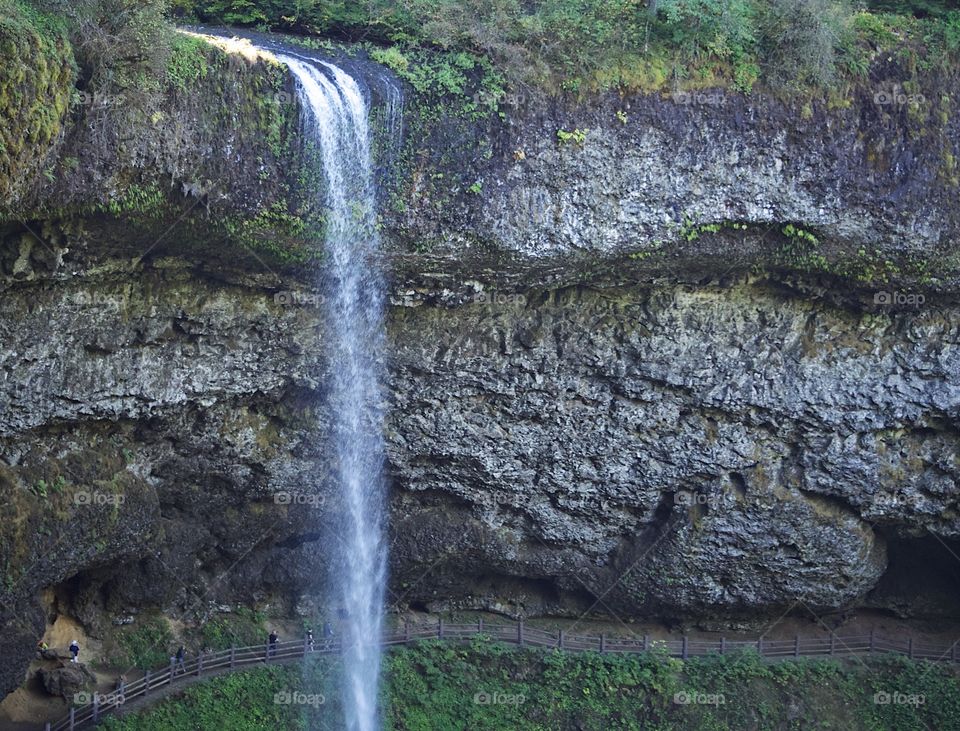 South Falls in Silver Falls State Park in Western Oregon goes over its textured cliff on a fall day. 