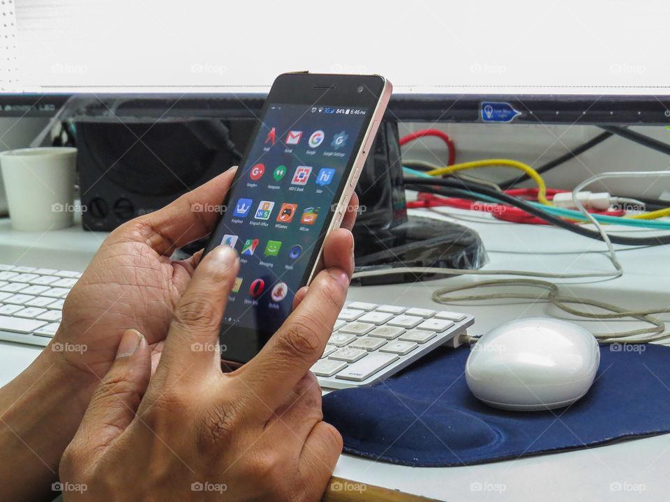 man holding android phone