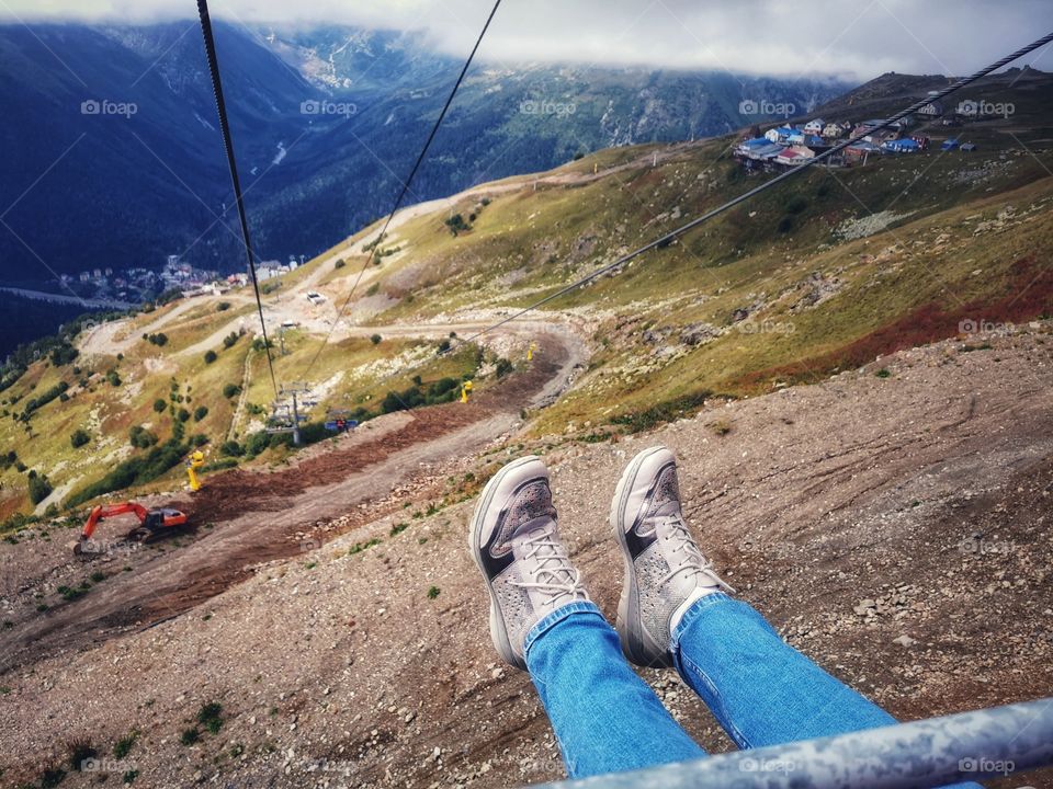 From up to above feet legs mountains hills field nature view eco focus day part sun sunny travel Light reys trip form plant part shades shape beauty greens outdoor freedom happy happiness