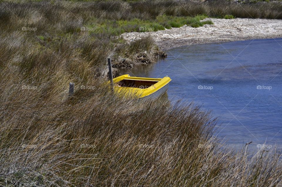 Lonely yellow boat