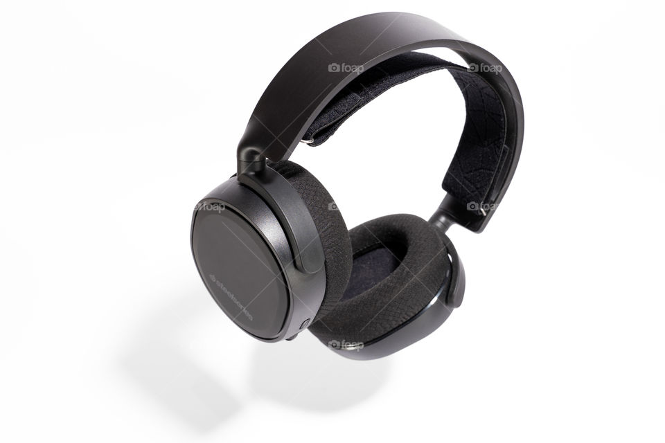 Steelseries gaming headset on white background with a shadow