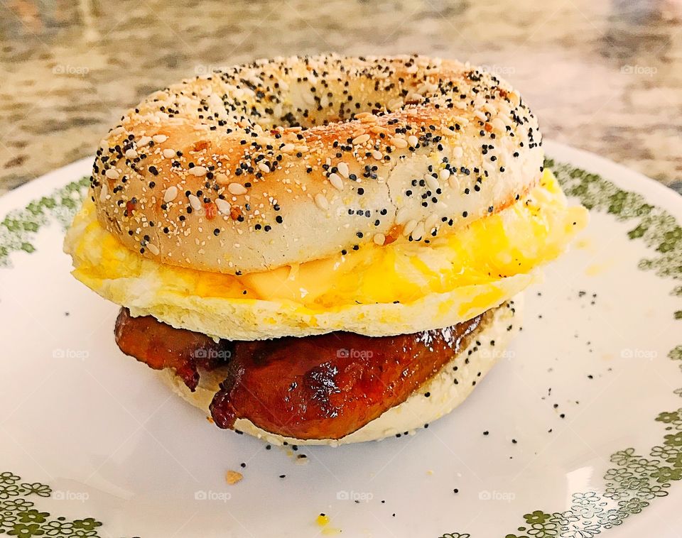 Sweet Italian sausage and egg and cheese on an everything bagel.