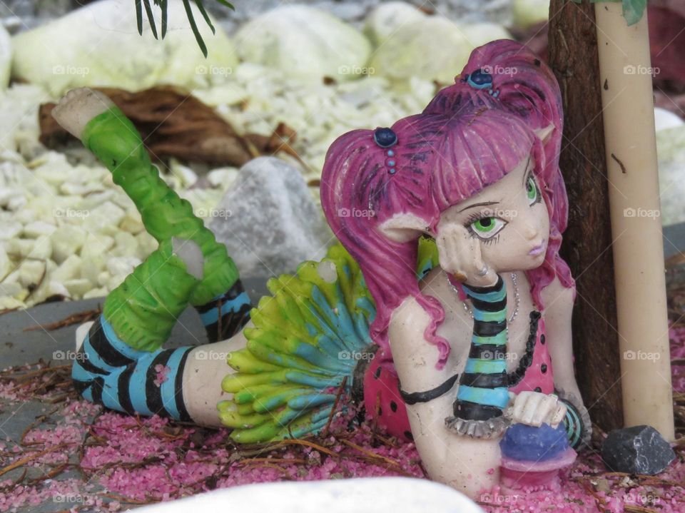 A girly elf in the garden