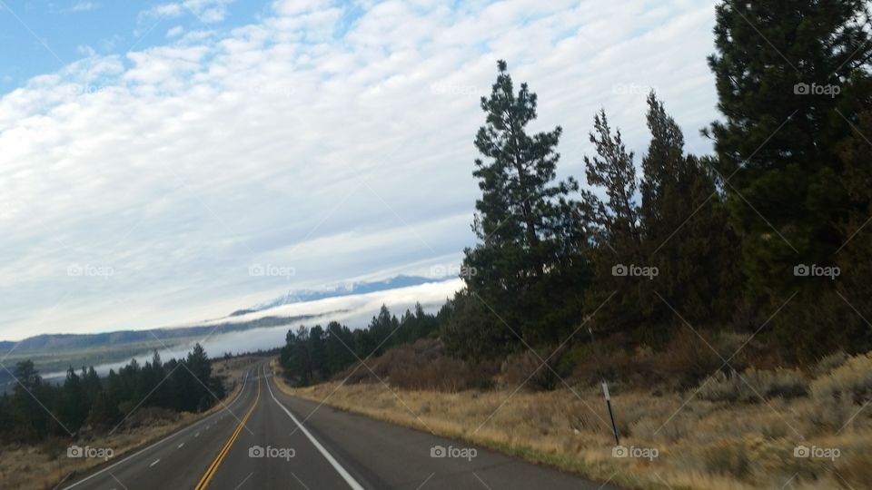 rolling clouds off Mount Shasta open roads