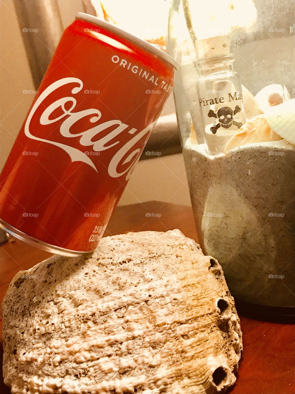 I enjoy having a Coke while dreaming of my next trip to the beach. 