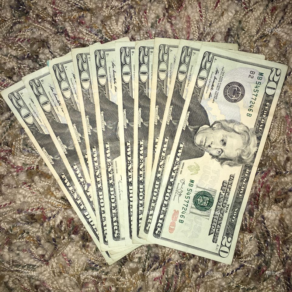 Twenty dollar bills. Two hundred dollars. 