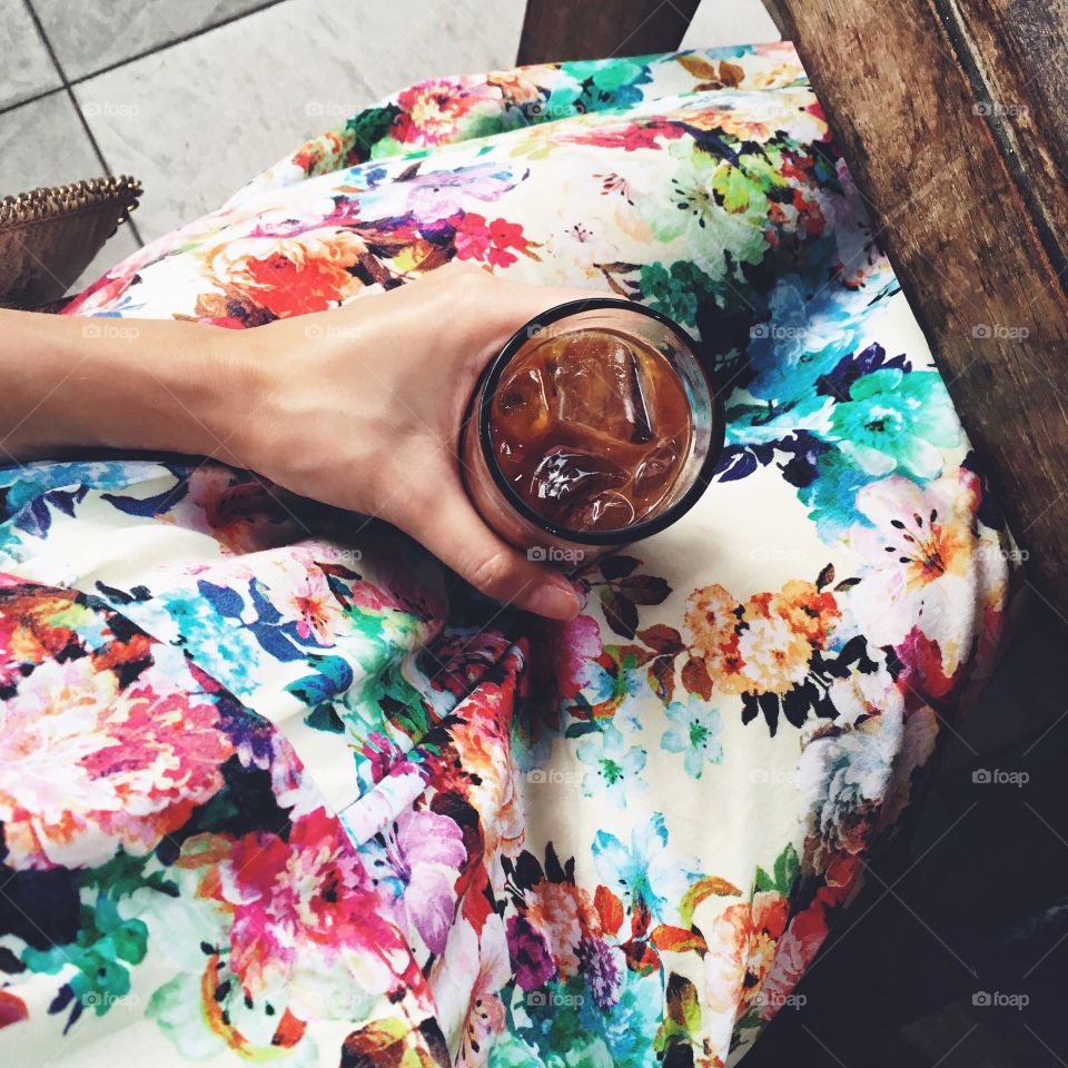 Woman drinking cold brew coffee