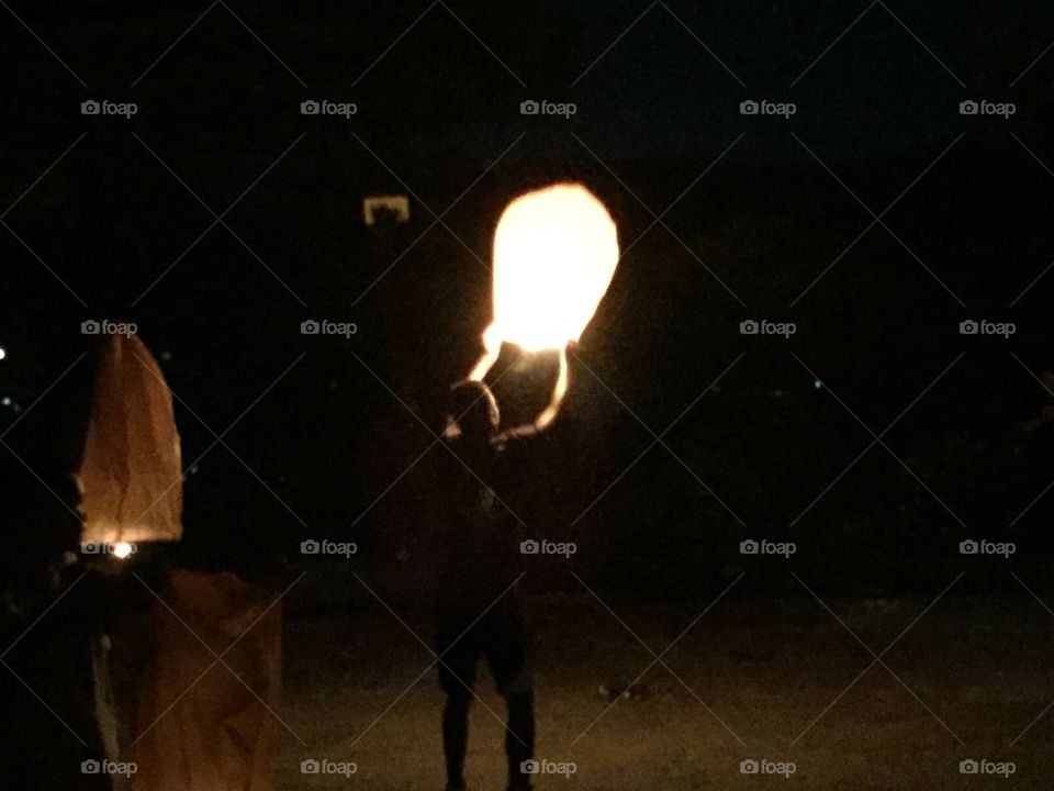 Big ballon releasing on full moon day and Mid-autumn Festival of Chinese Day in Mongla, Myanmay. Many couples released many ballon tonight. They write whatever they want on the ballon and release together.