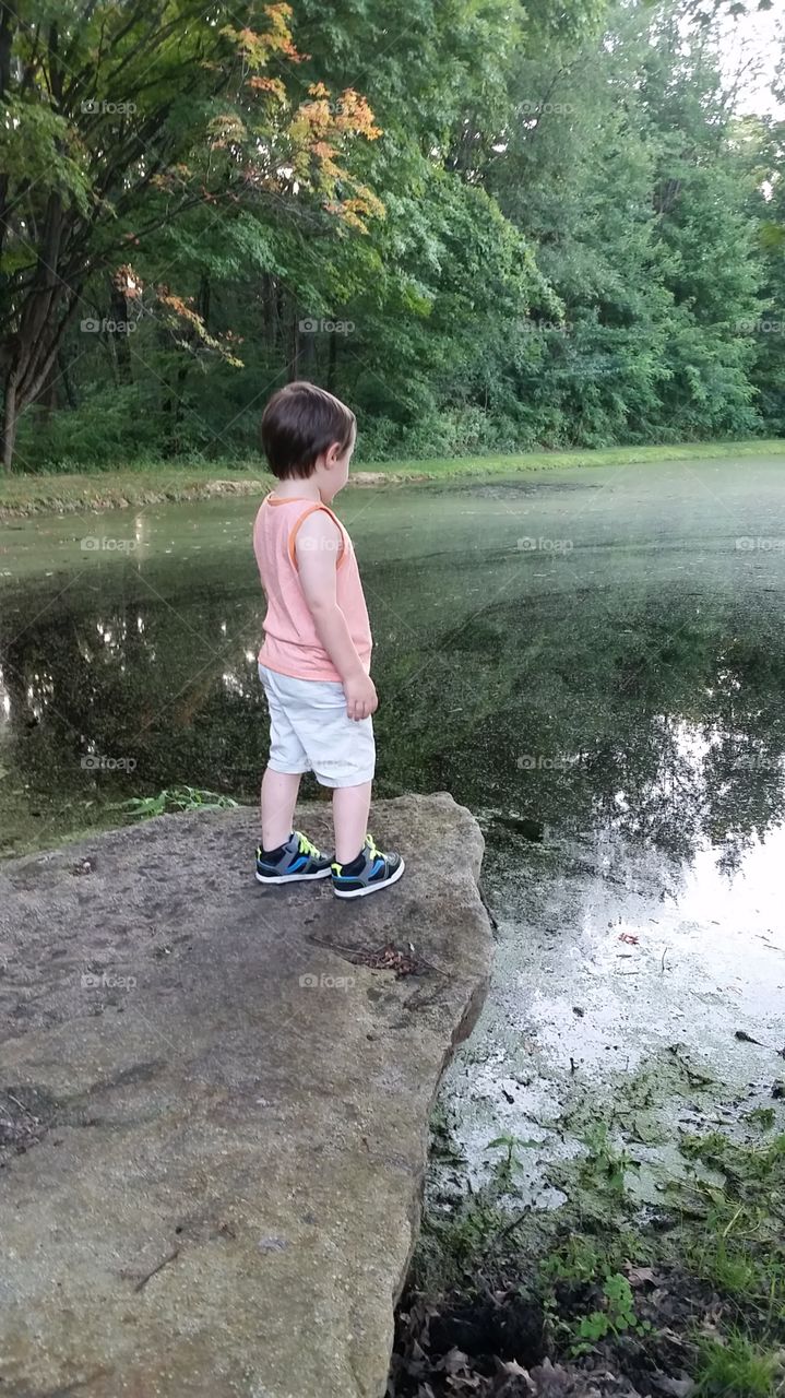 boy at pond. Camp Faith, Clymer, PA