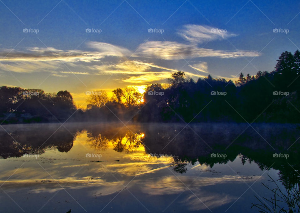 lake sunrise reflection silhouette by landon