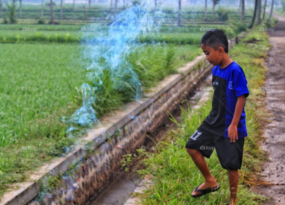 Child With Blue Smoke