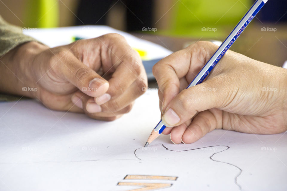 People drawing sketch with pencil, artists