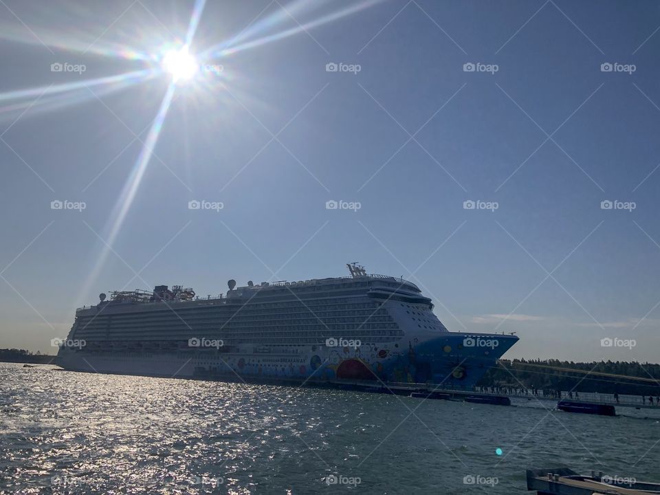 A cruise ship landed in  Baltic Sea on a sunny day
