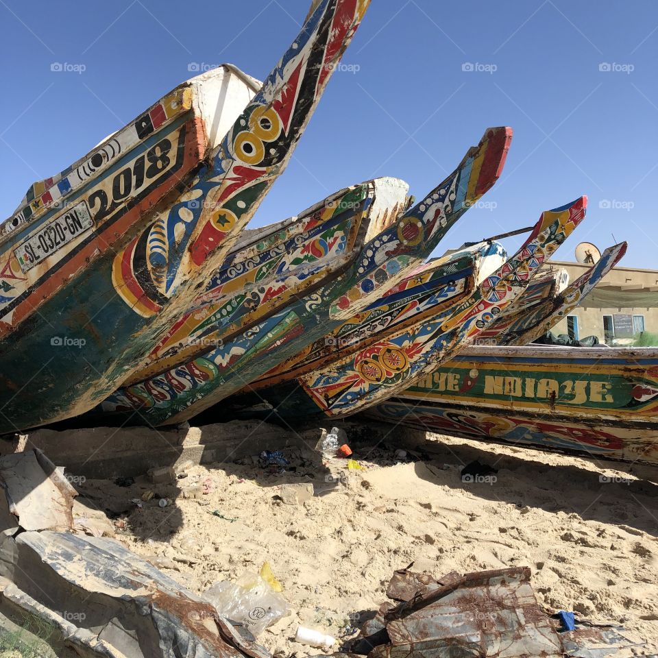 Pirogues (fishing boats) on the beach in Saint Louis, Senegal