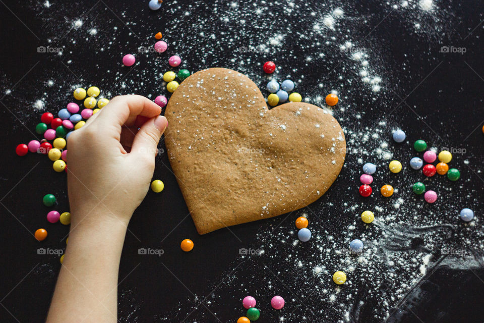 cooking and decorating ginger cookies