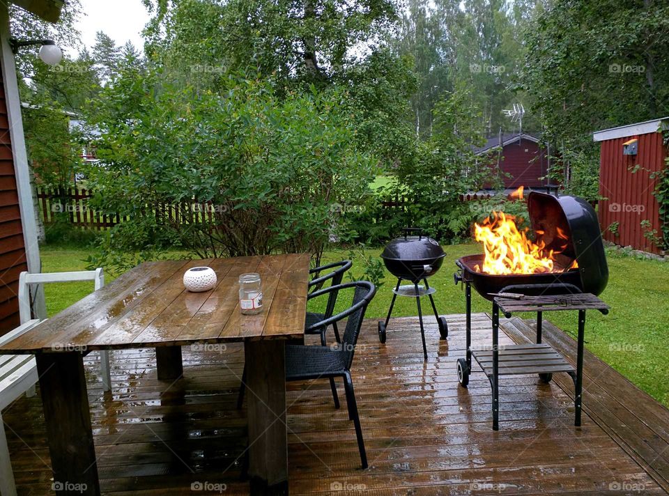 summer in sweden. barbecue is turned on