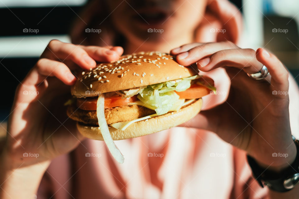 Woman holding fresh delicious big tasty