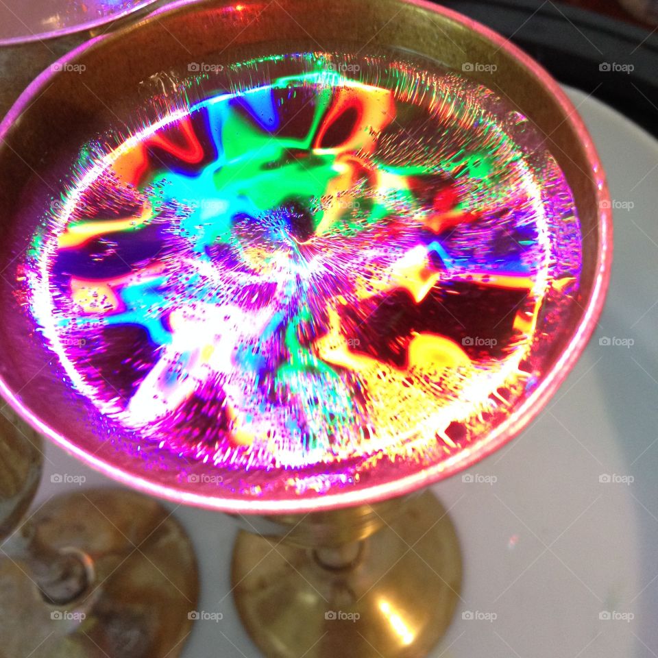 Cymatic Cup. In this photograph it take a silver cup and create vibrational Cymatic Frequency art