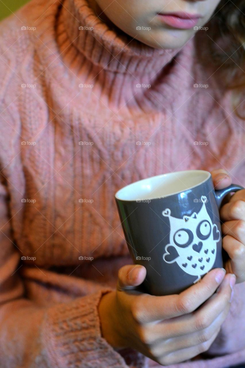 cup of tea in the hand girl cozy winter