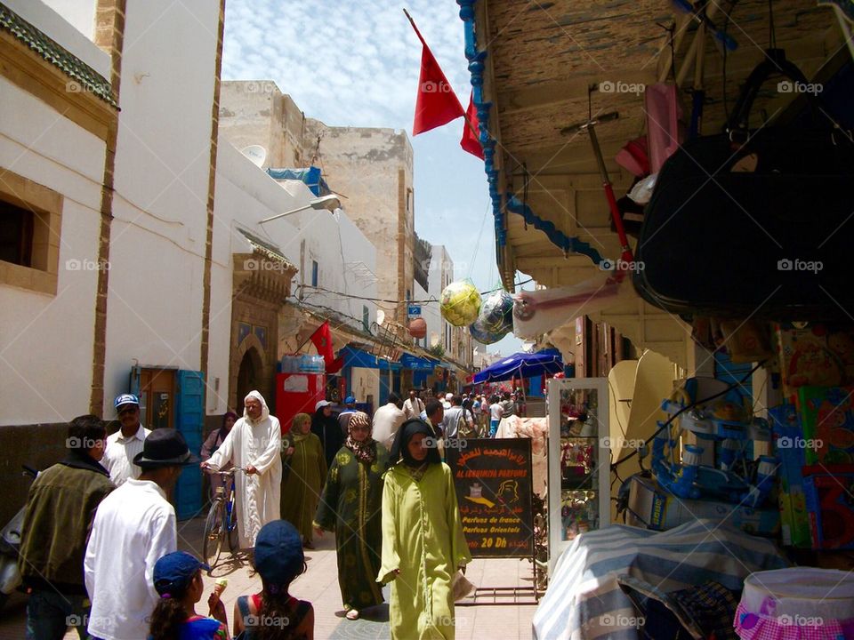 Local people os Essaouirra  in Morocco going about with their day to day life 