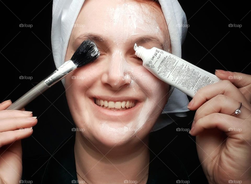Applying a face mask and creme