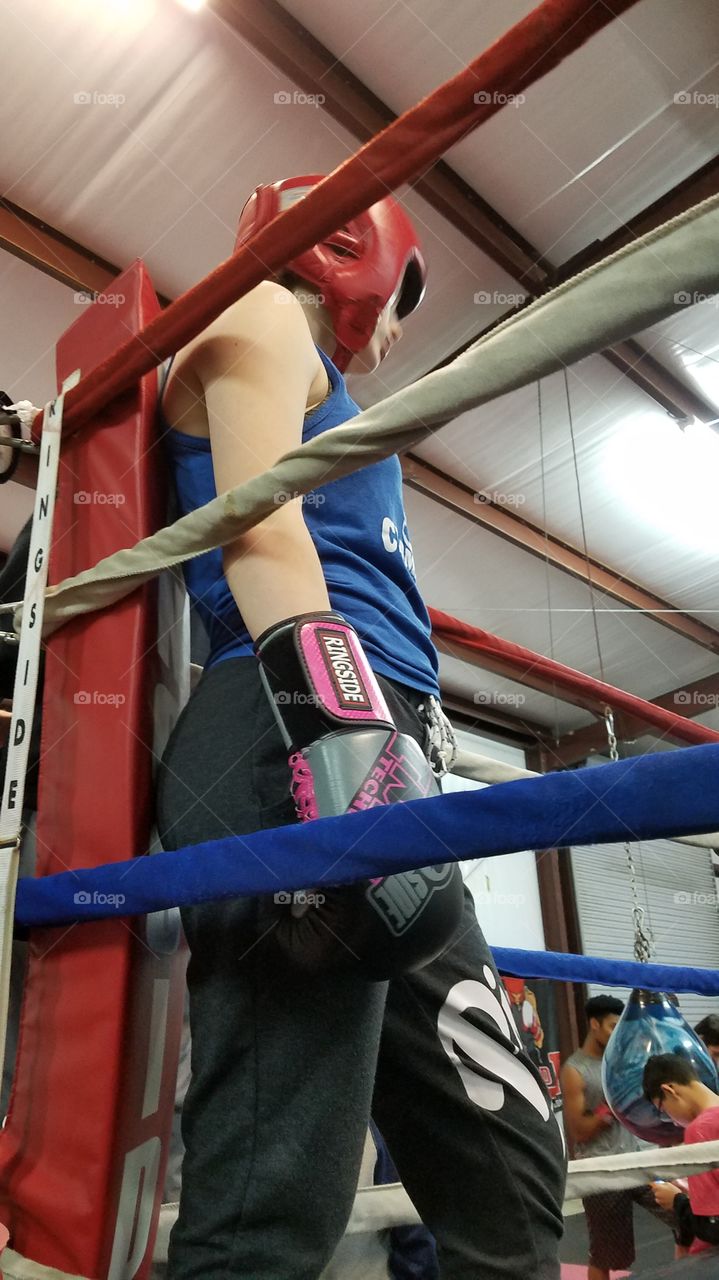girl boxer resting between rounds