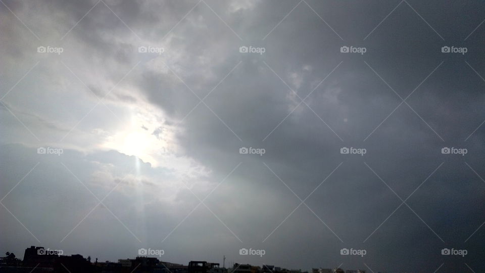 combination of Raining and Sun shining