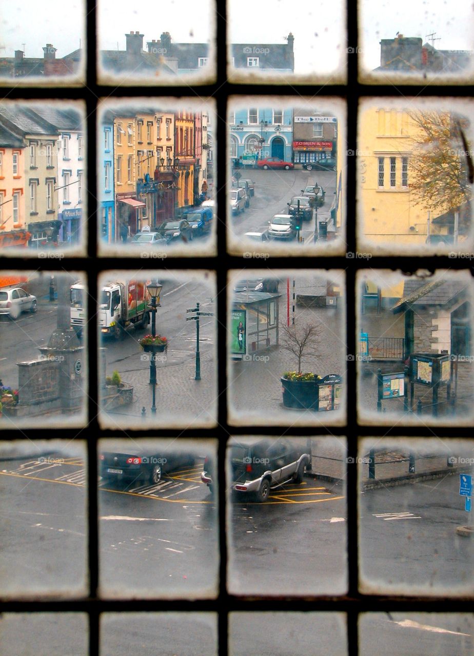 View through the window. View through a castle window down on a town in Ireland